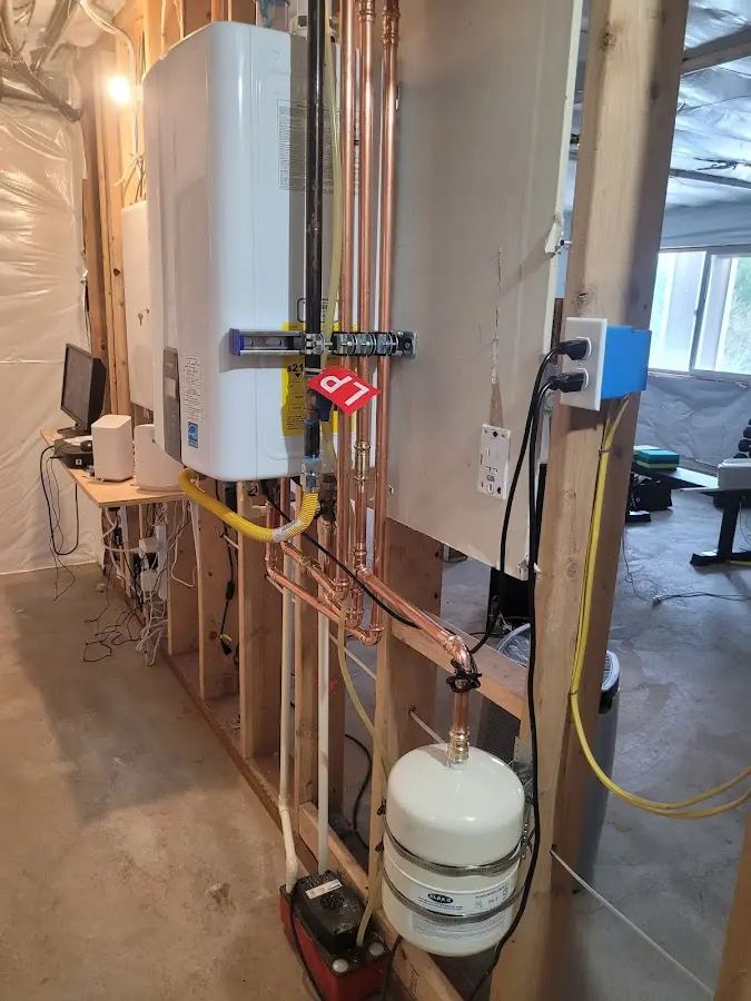 Licensed plumber repairing a kitchen sink in Niskayuna